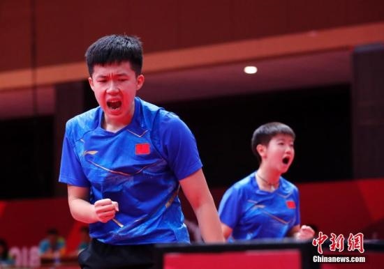 資料圖：雅加達(dá)亞運(yùn)會(huì)，王楚欽/孫穎莎奪得混雙冠軍。 <a target='_blank' href='/'>中新社</a>記者 劉關(guān)關(guān) 攝