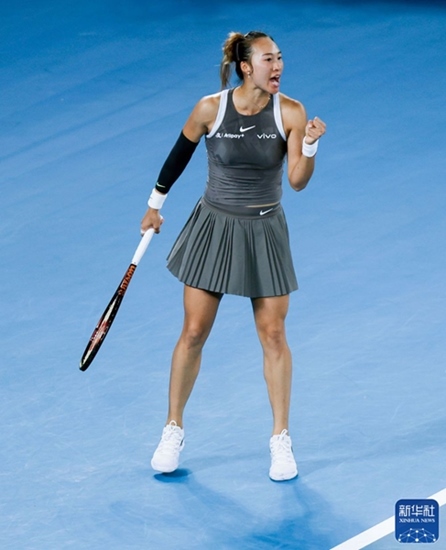 鄭欽文在比賽中慶祝得分。新華社記者 馬平 攝