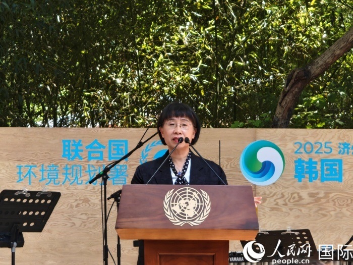 周國(guó)梅致辭。人民網(wǎng)記者 李明攝